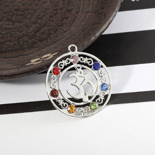 Load image into Gallery viewer, Chakra Balancing Pendant - 7 Reiki Symbols for Harmony &amp; Wellness
