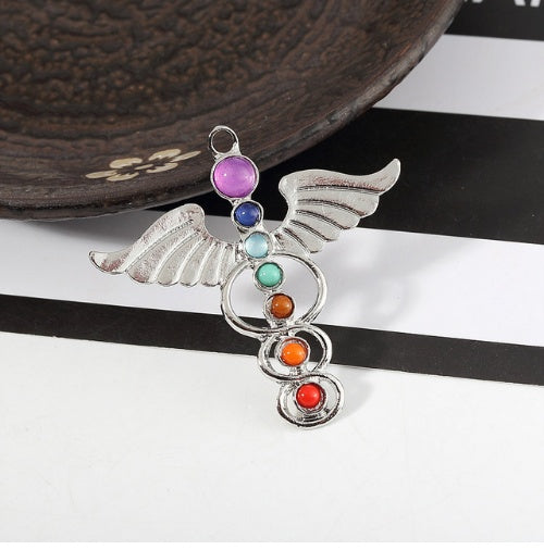 Load image into Gallery viewer, Chakra Balancing Pendant - 7 Reiki Symbols for Harmony &amp; Wellness
